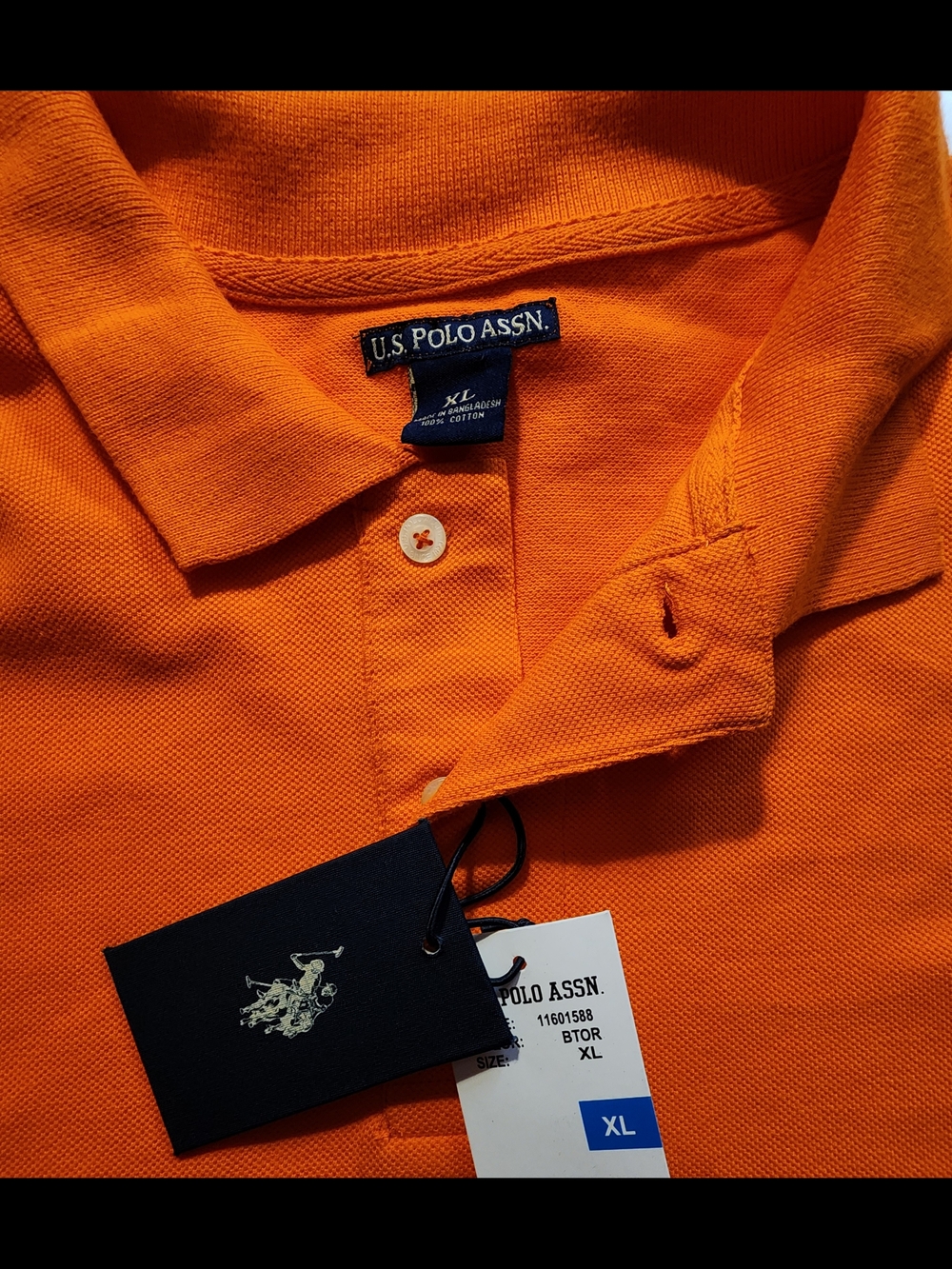 U.S. Polo Assn. Orange Polo with Navy Logo - Picture 2 of 4